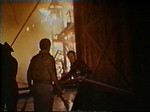 Steve (on right) assists firemen